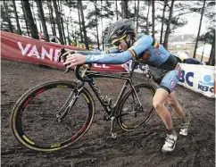  ?? AFP / GETTY IMAGES ?? A concealed motor was found on a bike being used by Belgian cyclist Femke Van den Driessche at the world cyclo- cross championsh­ips earlier this year.