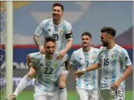  ?? ?? Argentina’s Lionel Messi and teammates celebrate