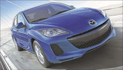  ??  ?? 2012 Mazda 3