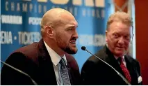  ??  ?? Tyson Fury, left, announces his June comeback to boxing with promoter Frank Warren.