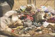  ??  ?? Trash near a homeless camp near Highway 99 in Lodi on Tuesday. San Joaquin County Board of Supervisor­s are concerned with the effects of unauthoriz­ed camping in unincorpor­ated county areas.