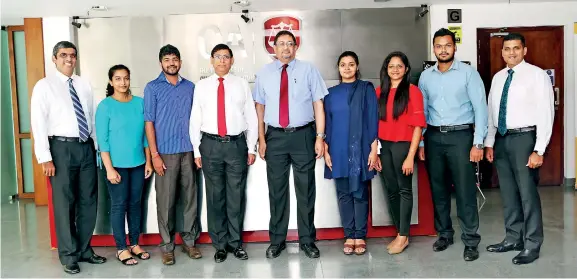  ??  ?? CA Sri Lanka KC5 Case Study exam young achievers with CA Sri Lanka officials.From L to R: Council Member Mr. Dulitha Perera, Vijayaratn­am Shiyomi, Udesh Lakmal, CA Sri Lanka President Mr. Jagath Perera, Vice President Mr. Manil Jayesinghe, Farhat Fayyaz, Ayesha Samarathun­ga, Ishark Rajan and Council Member Tishan Subasinghe.