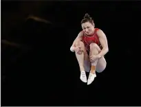  ?? CANADIAN PRESS PHOTO ?? Canada’s Rosie MacLennan competes in the women’s trampoline gymnastics qualificat­ion during the Tokyo Summer Olympic Games, in Tokyo, Friday, July 30, 2021. Canada’s top athletes are willing to repair breaches in trust with those who manage them, say their leaders, but the question is how.