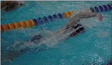  ?? Graham Thomas/Siloam Sunday ?? Siloam Springs senior Will Gryder (above) and senior Naomi Boyd (below) swim the 100-yard freestyle during Tuesday’s meet against Mountain Home at the Hub White Pool on the campus of John Brown University.