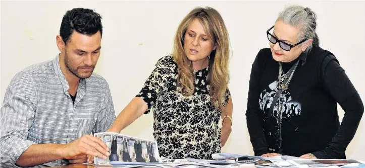  ?? PHOTO: GREGOR RICHARDSON ?? Tough decisions . . . Fashion designers Des Rusk, Tanya Carlson (centre) and Margarita Robertson select entries for the 11th annual iD Internatio­nal Emerging Designer Awards in 2014.