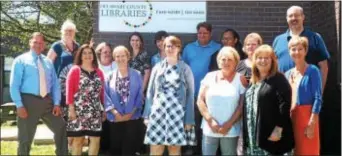  ??  ?? Catherine Bittle, second from right, was welcomed to her new post as director of Delaware County Libraries (DCL) Monday, Aug. 22, at a luncheon for the DCL staff hosted by Delaware County Councilman Dave White, far left. Shown at the DCL office in...