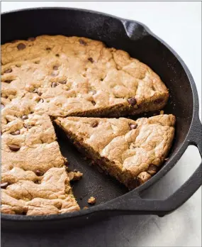  ?? PHOTO COURTESY OF AMERICA’S TEST KITCHEN ?? Chocolate Chip Skillet Cookies. Unlike with a traditiona­l batch of cookies, this treatment doesn’t require scooping, baking, and cooling multiple sheets of treats; the whole thing bakes at once in a single skillet.