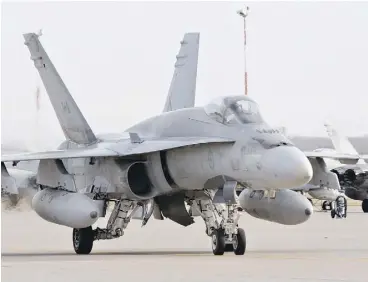  ?? JASON FRANSON / THE CANADIAN PRESS FILES ?? Previous government­s have pointed out that Canada always answers the call to aid its allies. However, that argument carries little water, writes John Ivison, in light of the federal government’s choice to pull its CF-18 fighters from Iraq.