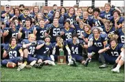  ?? PAUL DICICCO - FOR THE NEWS-HERALD ?? Kirtland poses with the Division V state title after a 38-0 state final win over Ironton on Nov. 21 in Massillon.