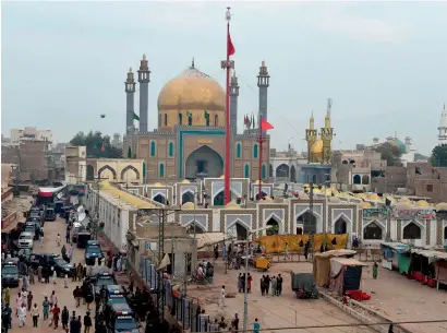  ?? AFP ?? Security personnel deploy outside the shrine of 13th century Sufi saint Lal Shahbaz Qalandar, a day after a bomb blew up at the shrine in the town of Sehwan in Sindh province, some 200km from Karachi. —