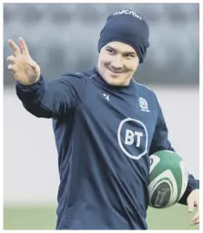  ??  ?? 2 Sam Johnson barges under the posts to score his sensationa­l try in last year’s astonishin­g 38-38 draw at Twickenham, and above, preparing for this year’s Calcutta Cup re-match at Murrayfiel­d.