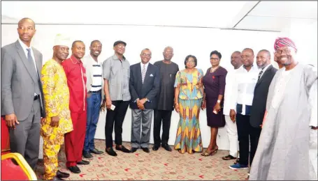  ??  ?? Director-General, Debt Management Office (DMO), Ms. Patience Oniha (seven right), in a group photograph with newspaper Editors during the breakfast meeting in Lagos....weekend.