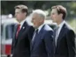  ?? ALEX BRANDON — THE ASSOCIATED PRESS ?? White House Staff Secretary Rob Porter, left, shown with White House Chief of Staff John Kelly, and White House senior adviser Jared Kushner, has resigned following allegation­s of domestic abuse by his two ex-wives.