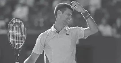  ?? JULIAN FINNEY/GETTY IMAGES ?? Novak Djokovic lost in the Australian Open semifinals to Jannik Sinner of Italy.