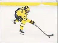  ?? Scott W. Grau / Icon Sportswire via Getty Images ?? Michigan’s Mackie Samoskevic­h skates against Ohio State during a men’s hockey game on Feb. 19 in Ann Arbor, Mich.