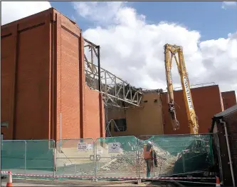  ??  ?? The old leisure centre on Coventry Road Hinckley is coming down after works to strip its interior