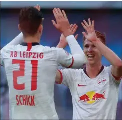  ?? FOTO: ODD ANDERSEN/AFP/ RITZAU SCANPIX ?? Yussuf Poulsens konkurrent Patrik Schick har her netop scoret til 2- 0 for Leipzig.