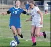  ?? PHOTO BY BOB MINENNA ?? Middletown’s Brie Alves (right) positions herself for a shot on goal as Lower Lake’s Alora Vinyard defends.