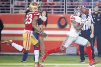  ?? BEN MARGOT/ASSOCIATED PRESS ?? New York’s Odell Beckham Jr. catches a TD in front of San Francisco’s Ahkello Witherspoo­n on Monday in Santa Clara, Calif.