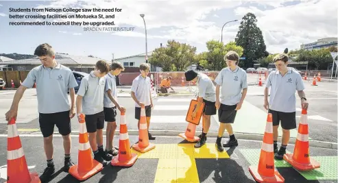  ?? BRADEN FASTIER/STUFF ?? Students from Nelson College saw the need for better crossing facilities on Motueka St, and recommende­d to council they be upgraded.