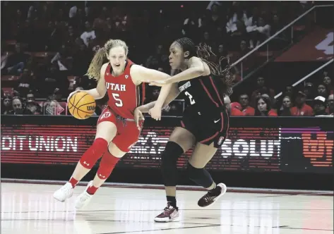  ?? ROB GRAY/AP ?? UTAH GUARD GIANNA KNEEPKENS (5) Saturday in Salt Lake City. drives against Stanford guard Agnes Emma-nnopu (2) in the second half of a game on