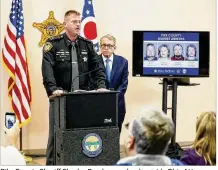  ?? JOHN MINCHILLO / ASSOCIATED PRESS ?? Pike County Sheriff Charles Reader speaks alongside Ohio Attorney General Mike DeWine during a news conference Tuesday concerning the developmen­ts in the slayings of eight members of one family in Pike County two years ago.