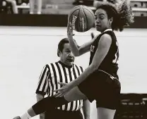  ??  ?? Roosevelt guard Jennifer Pavon saves a ball from going out of bounds during the Rough Riders’ first District 27-6A loss.