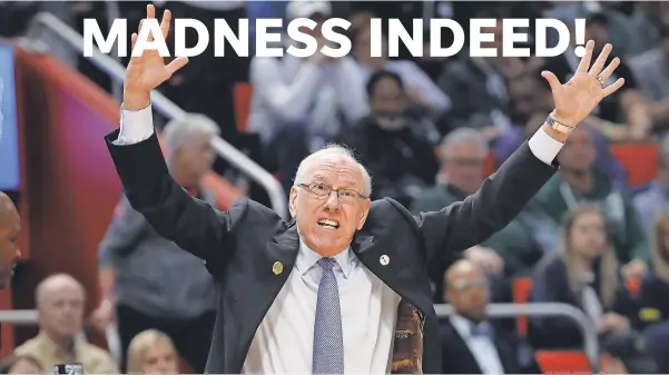  ??  ?? Syracuse coach Jim Boeheim’s 11th-seeded Orange knocked off No. 3 seed Michigan State, one of many upsets in a chaotic tournament. RICK OSENTOSKI/USA TODAY SPORTS