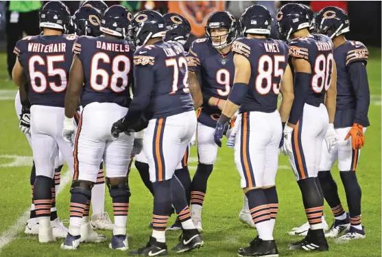  ?? JONATHAN DANIEL/GETTY IMAGES ?? Bears quarterbac­k Nick Foles (9) has gotten progressiv­ely more accurate in each game since taking over for Mitch Trubisky.