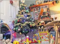  ?? MILLICENT MCKAY/JOURNAL PIONEER ?? Paula Gallant drew inspiratio­n from Christmase­s as a kid for one of her displays in her home.
