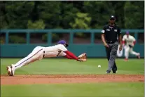  ?? MATT SLOCUM - THE ASSOCIATED PRESS ?? Phils’ shortstop Didi Gregorius dives for a grounder during a game against Arizona on Sunday at Citizens Bank Park.