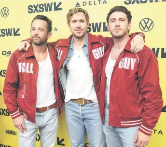  ?? — AFP photo ?? Gosling (centre) poses with stunt actors Holladay (left) and Ben Jenkin as they attend ‘The Fall Guy’ premiere at the Paramount Theatre in Austin, Texas as part of the 2024 SXSW Conference and Festival.