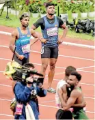  ?? ?? Sri Lanka’s Kalinga Kumarage (left) finished seventh in the Men’s 400m final, behind compatriot Aruna Darshana, who finished sixth (right)