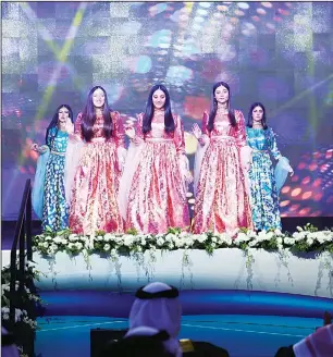  ??  ?? Kuwaiti performers on stage during the opening ceremony of the 8th Amir’s Internatio­nal ShootingGr­and Prix.