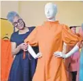 ?? KIM HAIRSTON/BALTIMORE SUN ?? Jody Davis, a Baltimore fashion designer, now makes dresses that are less restrictiv­e.