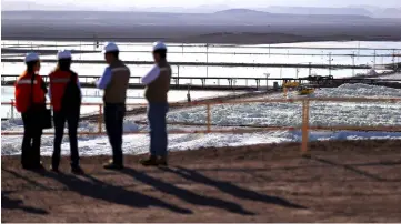  ??  ?? Managers meet on a hill at the SQM nitrates plant in Coya Sur next to Maria Elena town, northern of Chile. — Reuters photo