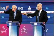  ?? ERIN SCHAFF / THE NEW YORK TIMES ?? Former Vice President Joe Biden (right) and Sen. Bernie Sanders, I-Vt., are set to meet tonight in their first oneto-one presidenti­al primary debate after months of Democratic free-for-alls.