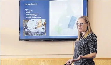  ?? DAILY TIMES PHOTOS ?? Groundwork Studio principal landscape architect Amy Bell discusses a potential aerial adventure park Wednesday during a community meeting at Farmington City Hall.