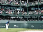  ?? GETTY IMAGES ?? The par-three 16th hole at the Waste Management Phoenix Open, where Cory Renfrew of Victoria holed a chip in 2015, is known for its raucous fans. Above, Jordan Spieth attempts his birdie putt on the hole this year.