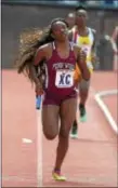  ?? PETE BANNAN — DIGITAL FIRST MEDIA ?? Penn Wood’s Janae Pitt, shown competing in Thursday’s victory in the 4 x 800-meter relay, helped the Patriots run a county-best 3 minutes, 45.57 seconds as the runner-up in the 4 x 400 Saturday at the Penn Relays.