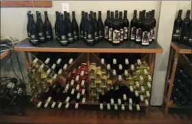  ?? SALLY CARPENTER HALE — THE ASSOCIATED PRESS ?? This photo shows wine for sale at the Cathedral Ridge Winery in Hood River, Ore., in the Columbia River Gorge.