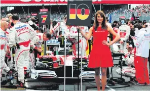  ??  ?? Formula One has ditched its ‘grid girls’ and darts will no longer have ‘walk-on girls’