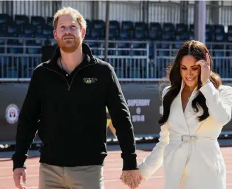  ?? Peter Dejong/Associated Press ?? Prince Harry and Meghan Markle, Duke and Duchess of Sussex at the Invictus Games in The Hague, Netherland­s in 2022. A spokespers­on for Prince Harry and Meghan says the couple were involved in a car chase while being followed by photograph­ers.