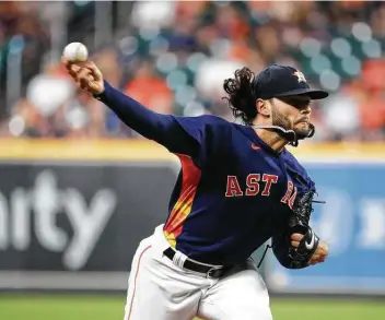  ?? Photos by Karen Warren / Staff photograph­er ?? Astros starting pitcher Lance McCullers Jr. got into jams early on but settled down to record seven strikeouts over six innings of work to earn the win — often inducing ground balls to get out of trouble.