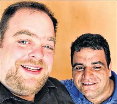 ?? SUBMITTED PHOTO ?? Eddie Rossiter, left, poses with his friend, Ronni Pupo Pupo, who was killed in the Cuban plane crash last Friday.