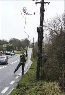  ?? Pics: ?? Repairing a power line along the N17. Donal Hackett.