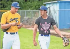  ?? GARY PORTER / MILWAUKEE JOURNAL SENTINEL ?? Jonathan Wizner (right) and Connor Stoming are two of the key cogs in Germantown's lineup.