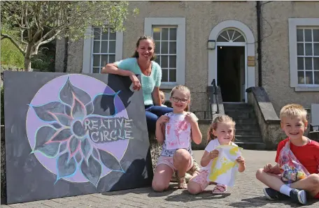  ??  ?? Yvonne Byrne with Anna and Olivia Byrne and Milo Jackson at the Childrens Printmakin­g workshop run by artist Yvonne Byrne at Millmount.