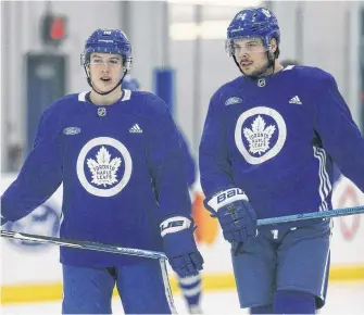  ?? JACK BOLAND • POSTMEDIA NEWS ?? Toronto Maple Leafs Mitch Marner right-winger (left) and teammate Auston Matthews during practice in Toronto in January 2019.