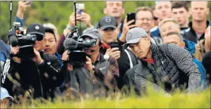  ?? Picture: REUTERS ?? DETERMINED: USA’s Jordan Spieth chips onto the 10th green during the first round of the 146th Open Championsh­ip at Royal Birkdale yesterday